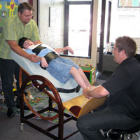 Dr. Fred Clary and Intern Matt work with Max Cerebral Palsy MN