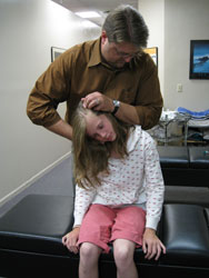 Dr. Clary treats a child at A Functional LifeRehab in New Brighton, MN